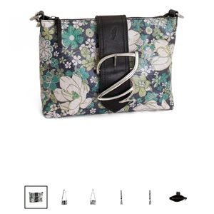 This is a Fluevog Rosalita purse. Purchased last year. NWOT. Never used.